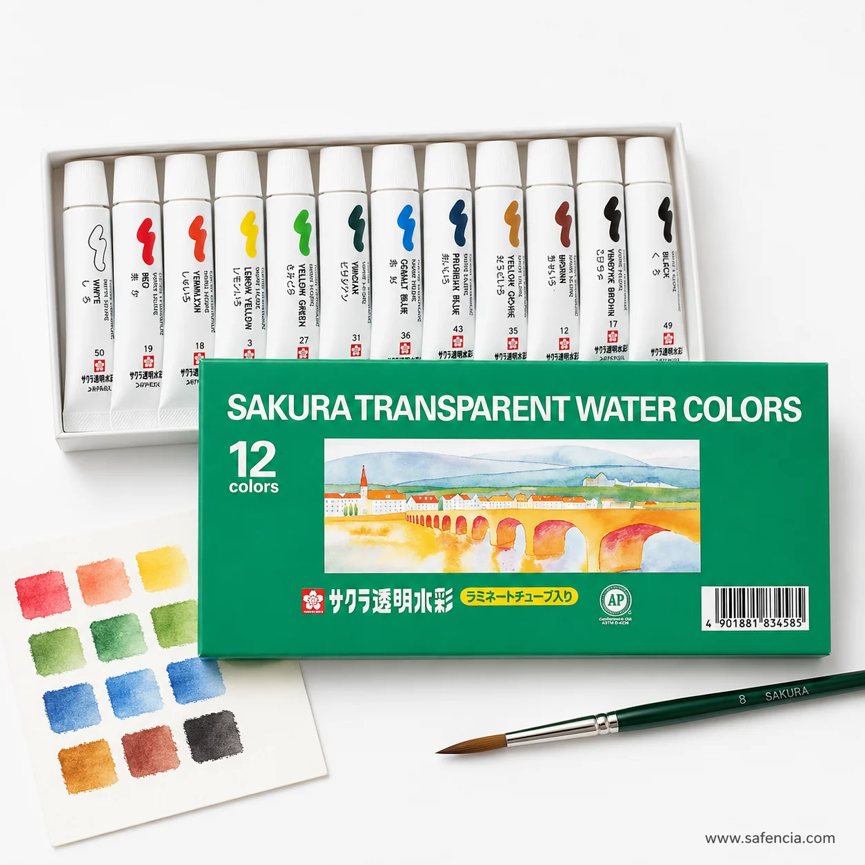 Twelve Sakura transparent watercolour tubes above a sheet of painted swatches showing each colour
