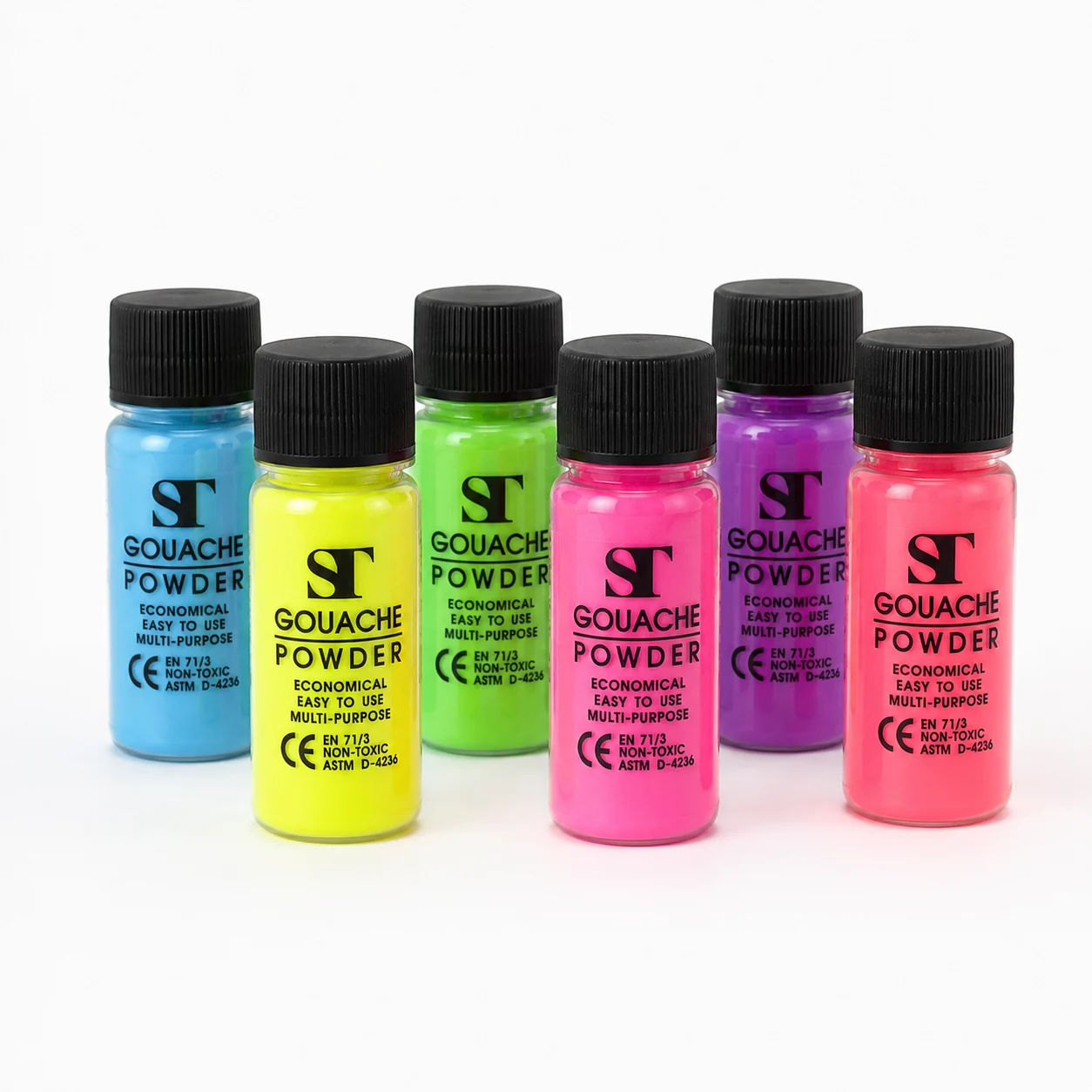 Group of six fluorescent ST gouache powder bottles photographed together on a white surface