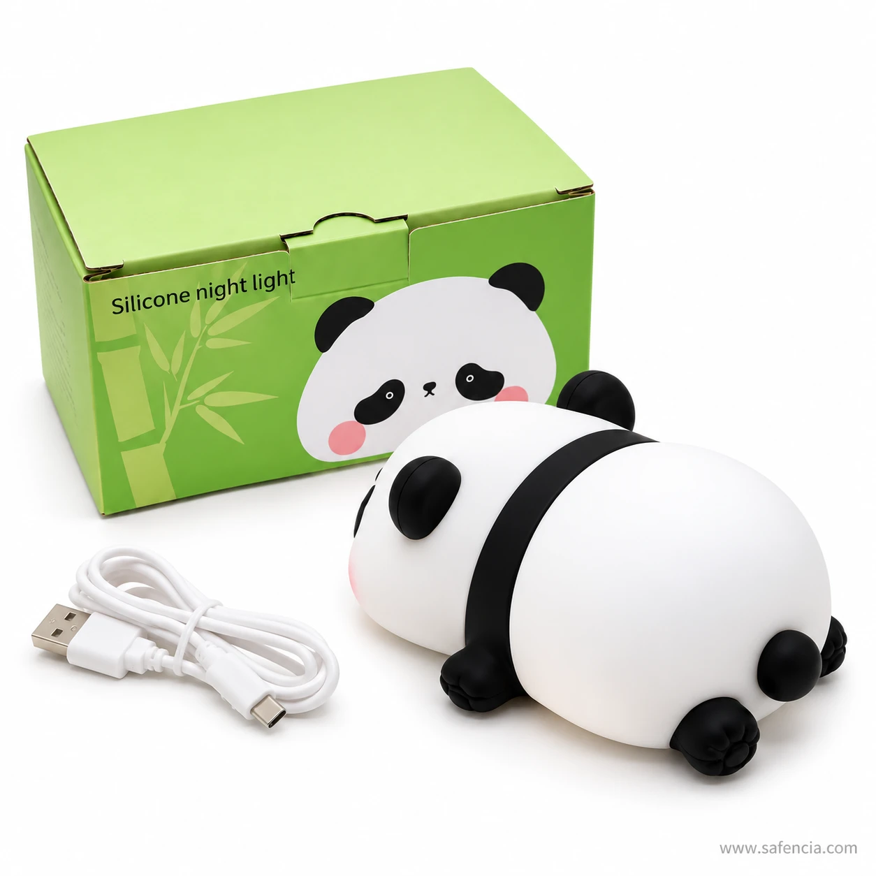 Panda lamp with its white USB-C cable coiled in front of the green gift box
