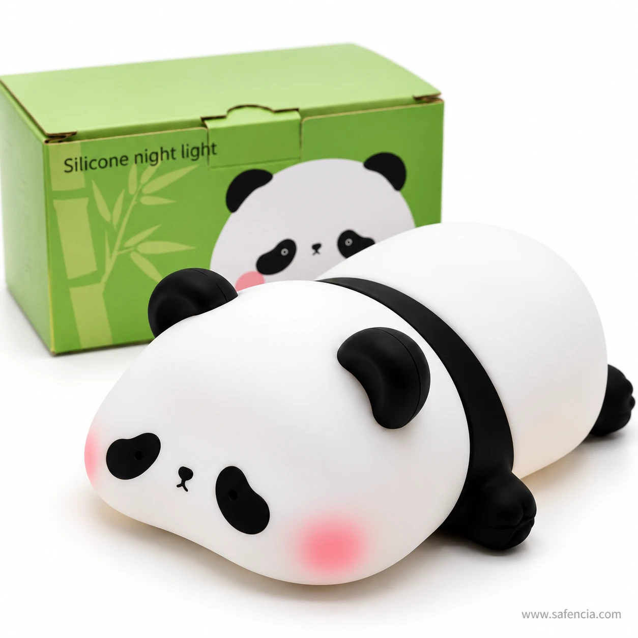 Close-up of the panda silicone lamp switched off, white body with black ears and band