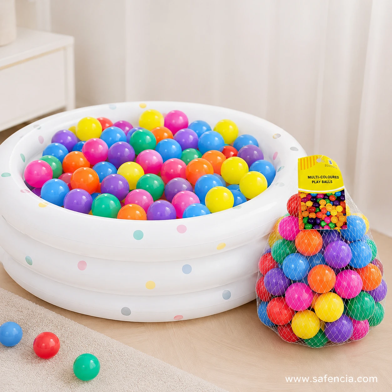 Inflatable baby pool transformed into a dry ball pit filled with multicolor soft plastic balls