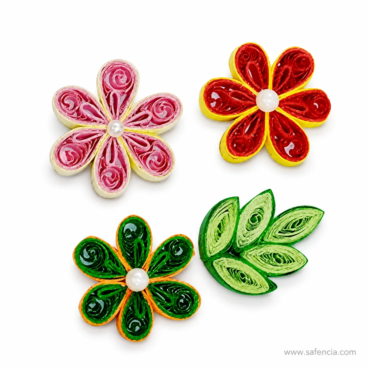 Rolled paper coil petals visible on small quilling craft flowers