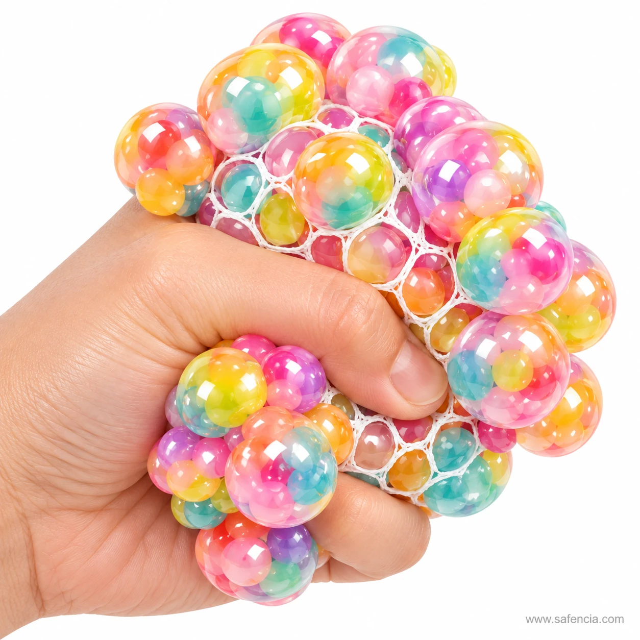 One-hand squeeze of the rainbow mesh stress ball with shiny pastel bubbles forming through the mesh