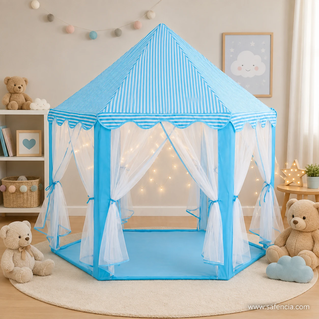 Blue castle play tent indoors with net curtains tied back and a string of fairy lights inside as styling