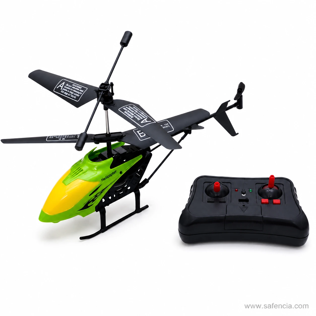 Green and yellow LH-1302 helicopter beside its black transmitter with red control sticks