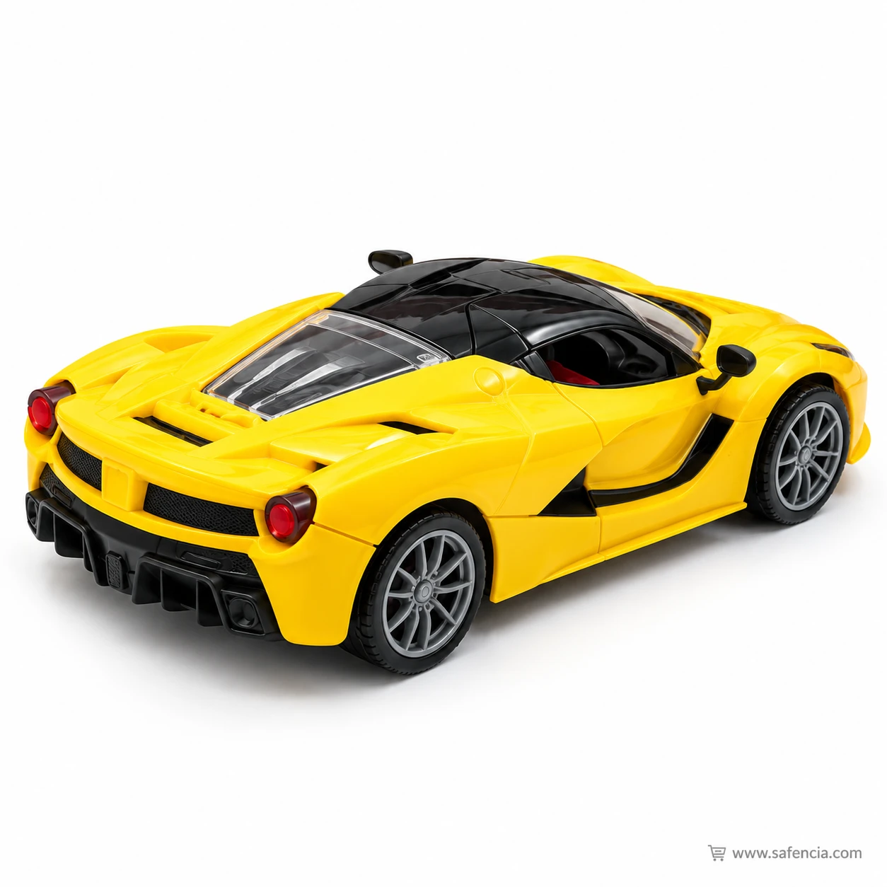 Rear three-quarter view of the yellow RC super car showing the red tail lights, black diffuser and wide rear wheels