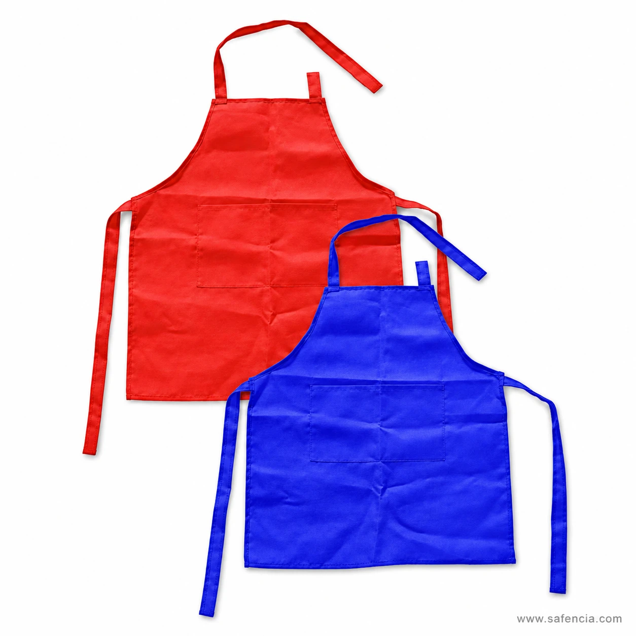 Red and blue rexine child's aprons at an angle showing the matt fabric surface