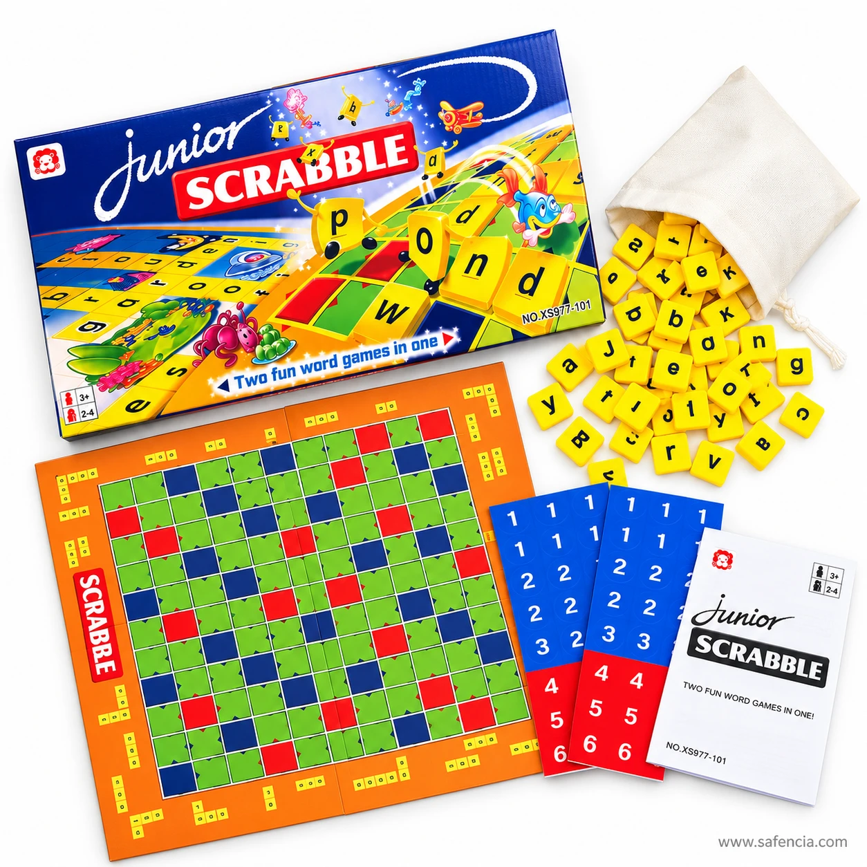 Empty Junior Scrabble board with green, blue and red squares on an orange frame, beside score cards and spilled letter tiles
