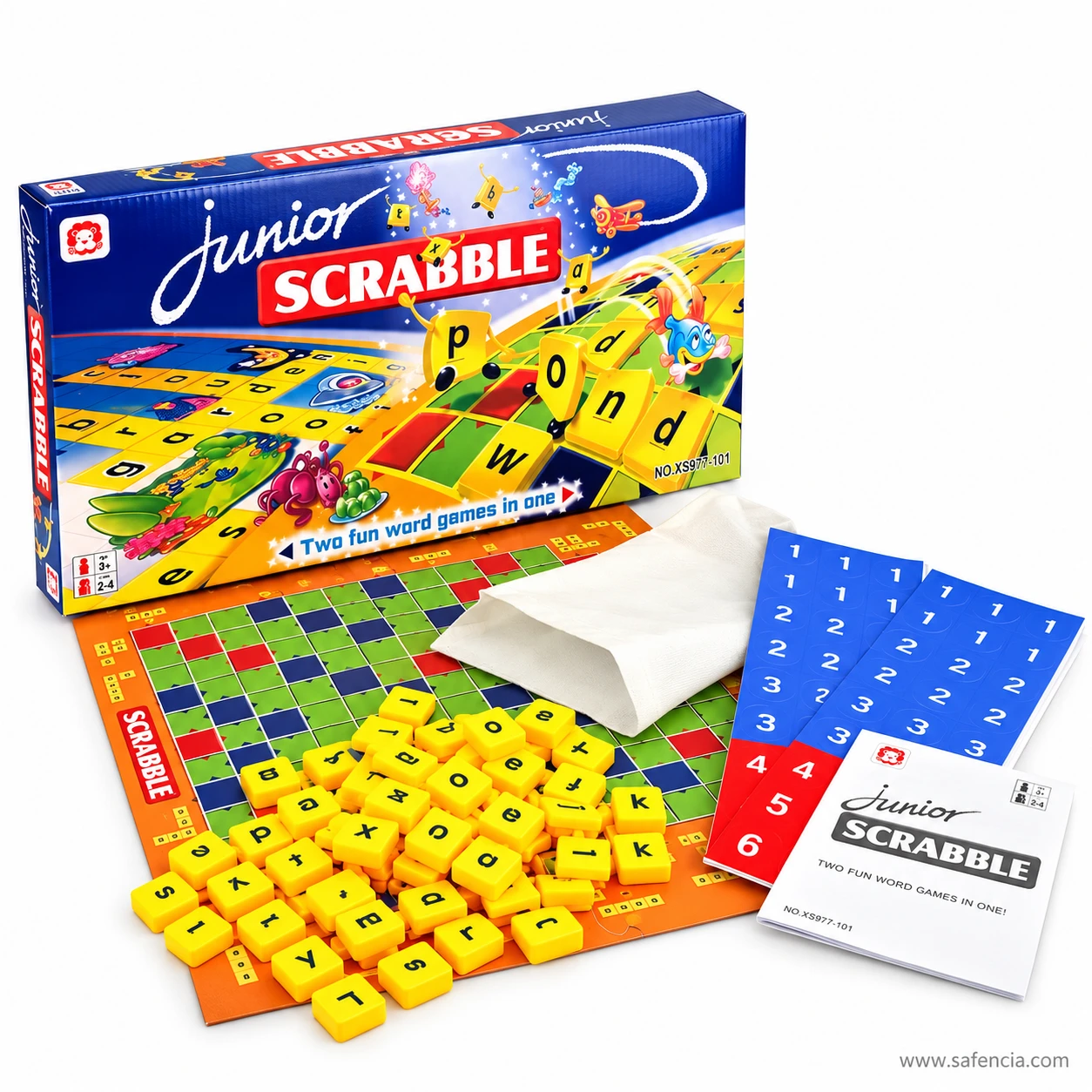 Pile of yellow Junior Scrabble letter tiles with lower-case letters, a white cloth tile bag and blue and red score cards