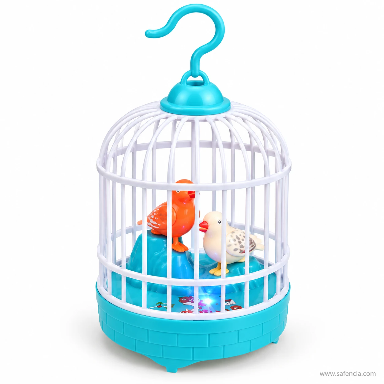 Close view of the blue singing bird cage toy with two birds and light glowing in the base