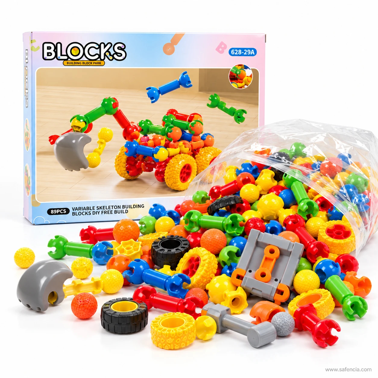 Colourful pile of skeleton building blocks spilling from their bag in front of the BLOCKS box, with wheels and a bucket