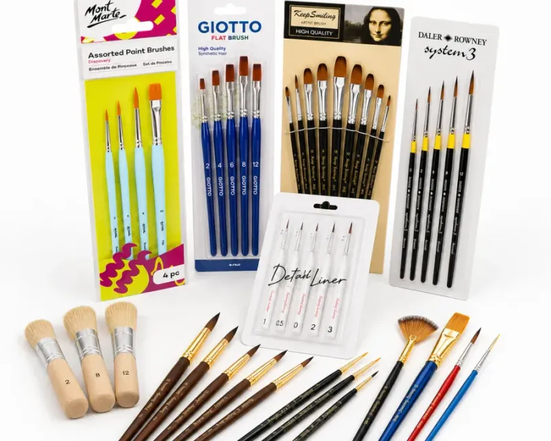 Paint brushes collection — Mont Marte and Giotto brush packs, a Keep Smiling artist brush card, a Daler-Rowney System 3 round set and loose round, flat, fan and gesso brushes