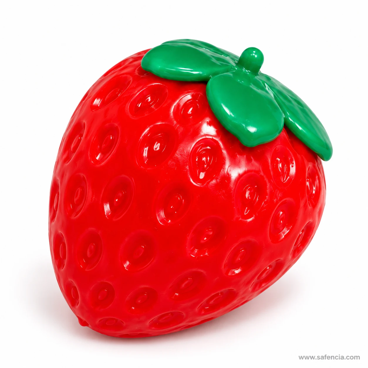 Front close-up of the strawberry squishy showing its shiny red skin and raised seed pattern