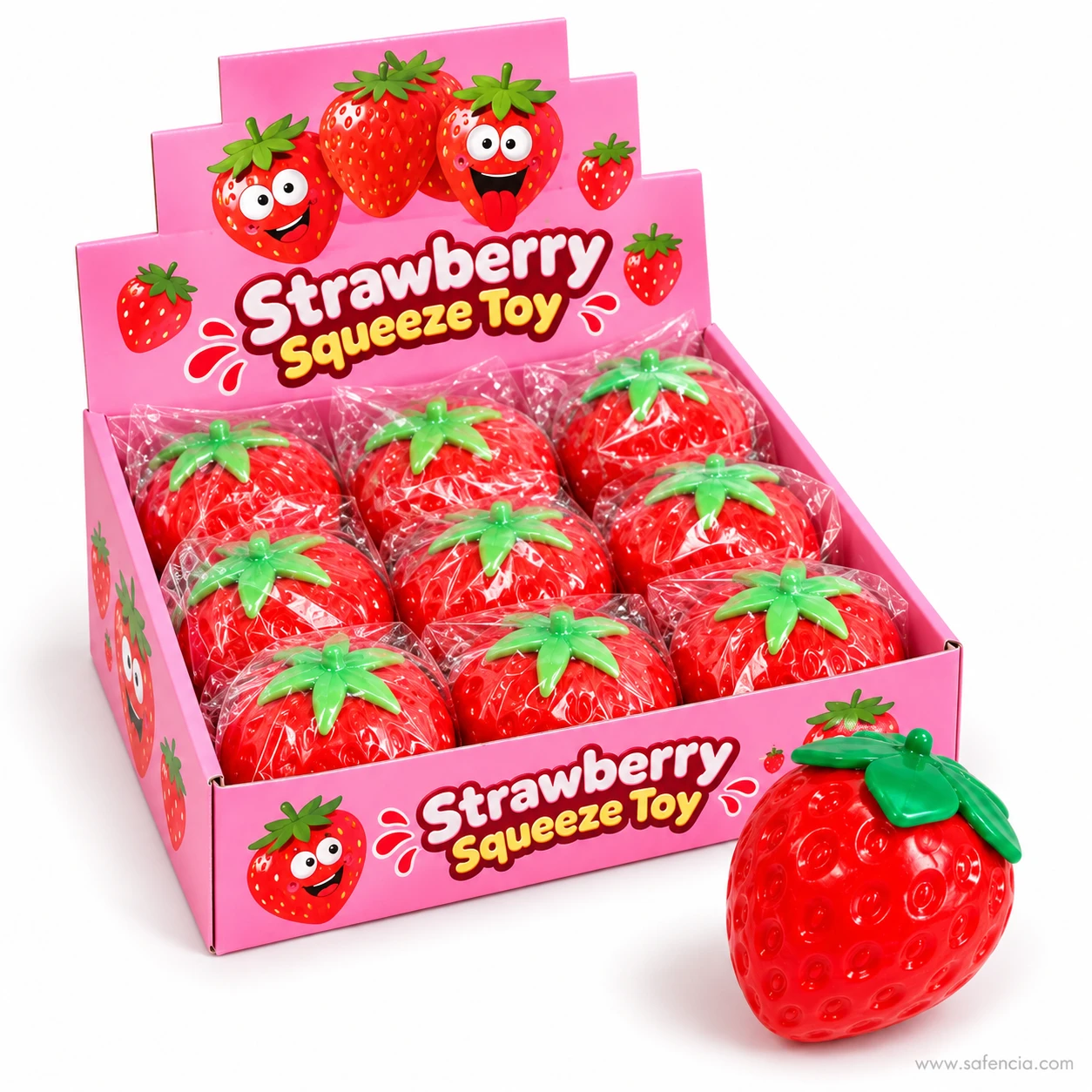 Strawberry squishy in front of a pink display box of twelve wrapped strawberry squeeze toys