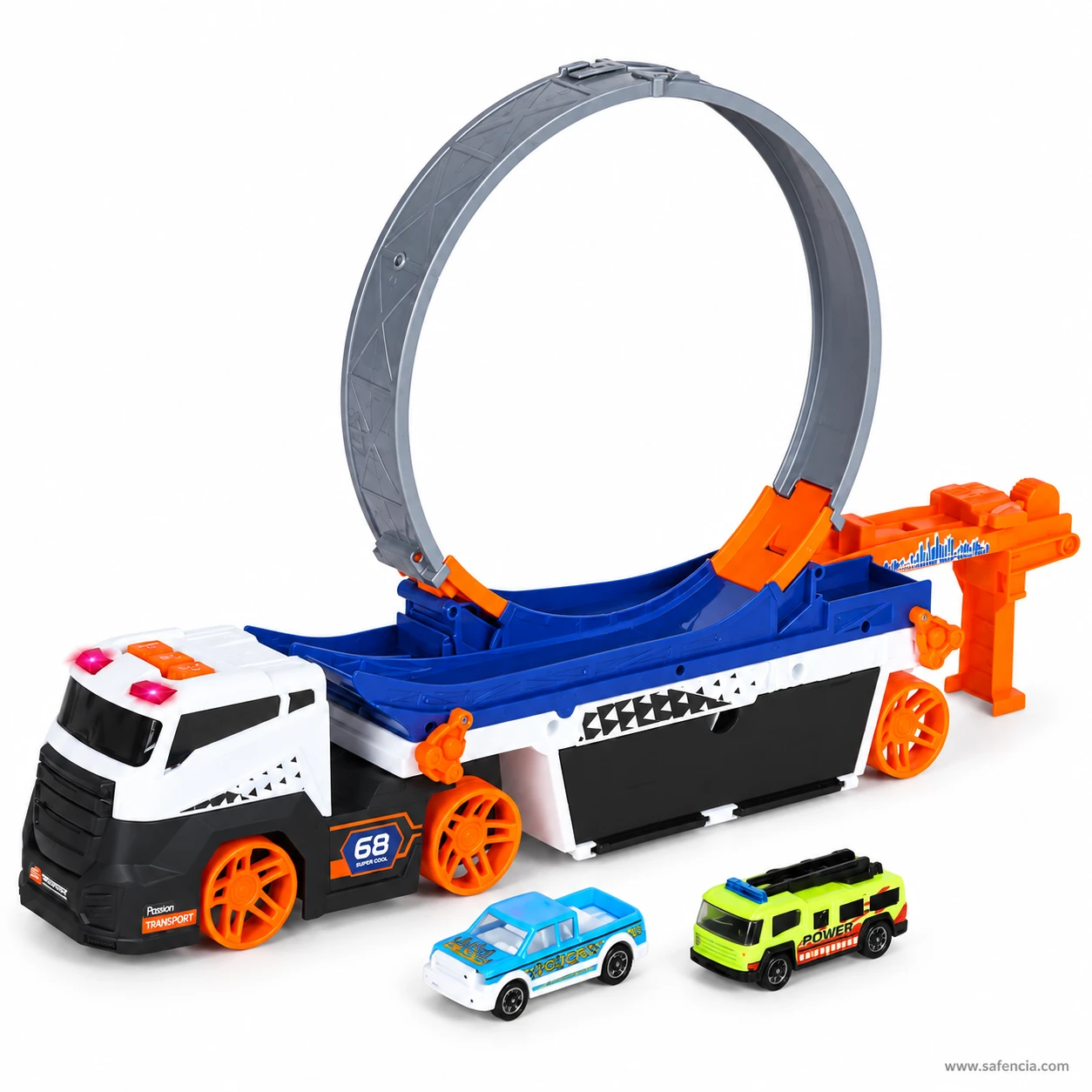 Stunt carrier truck with the loop mounted and two die-cast cars parked in front of the white cab