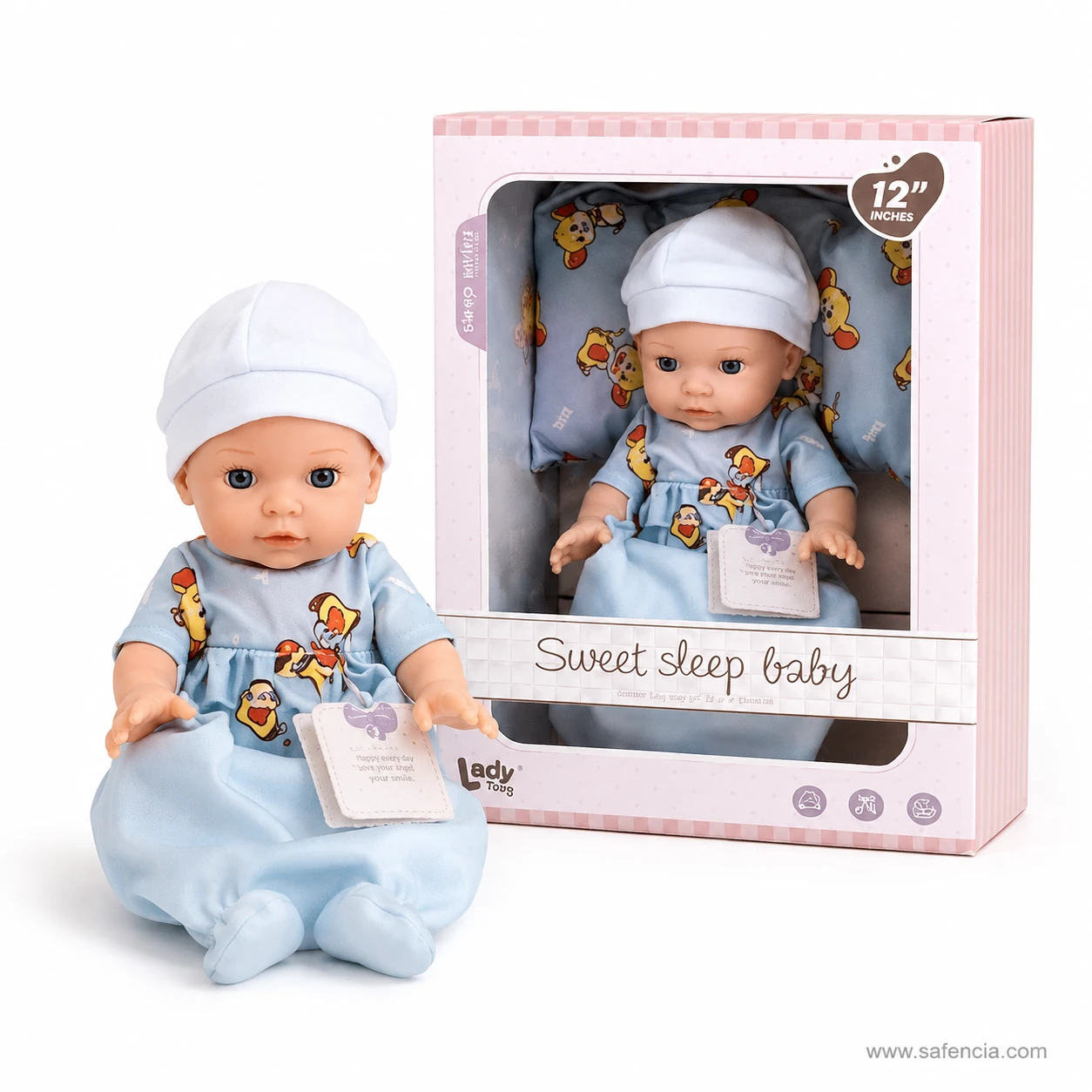Sweet Sleep baby doll seated beside her gift box showing the blue booties and gathered gown hem