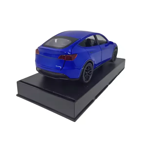 Metallic blue Tesla Model Y diecast model car rear angle view showing wheels and body detail