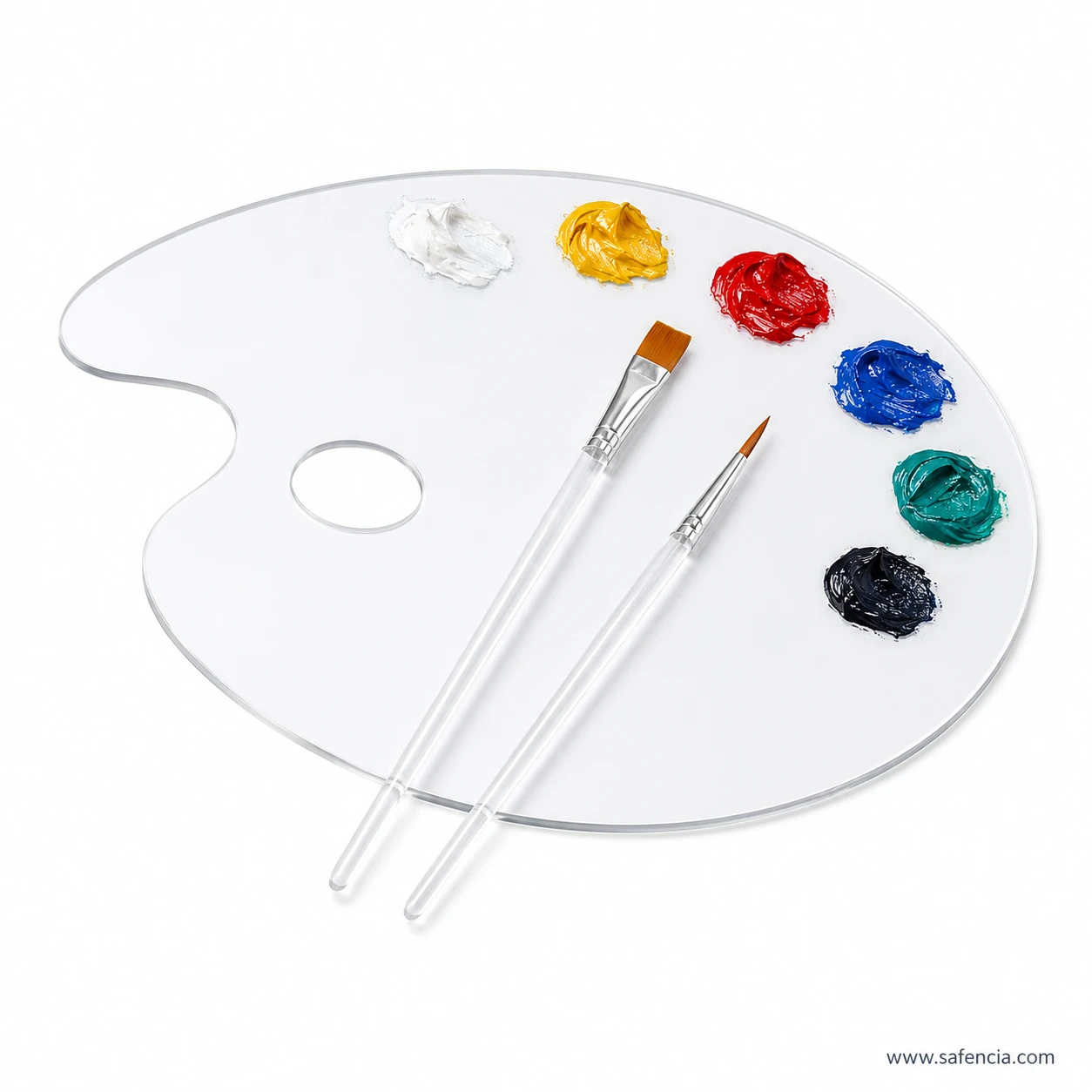 Clear oval palette shown in use with blobs of paint and two brushes