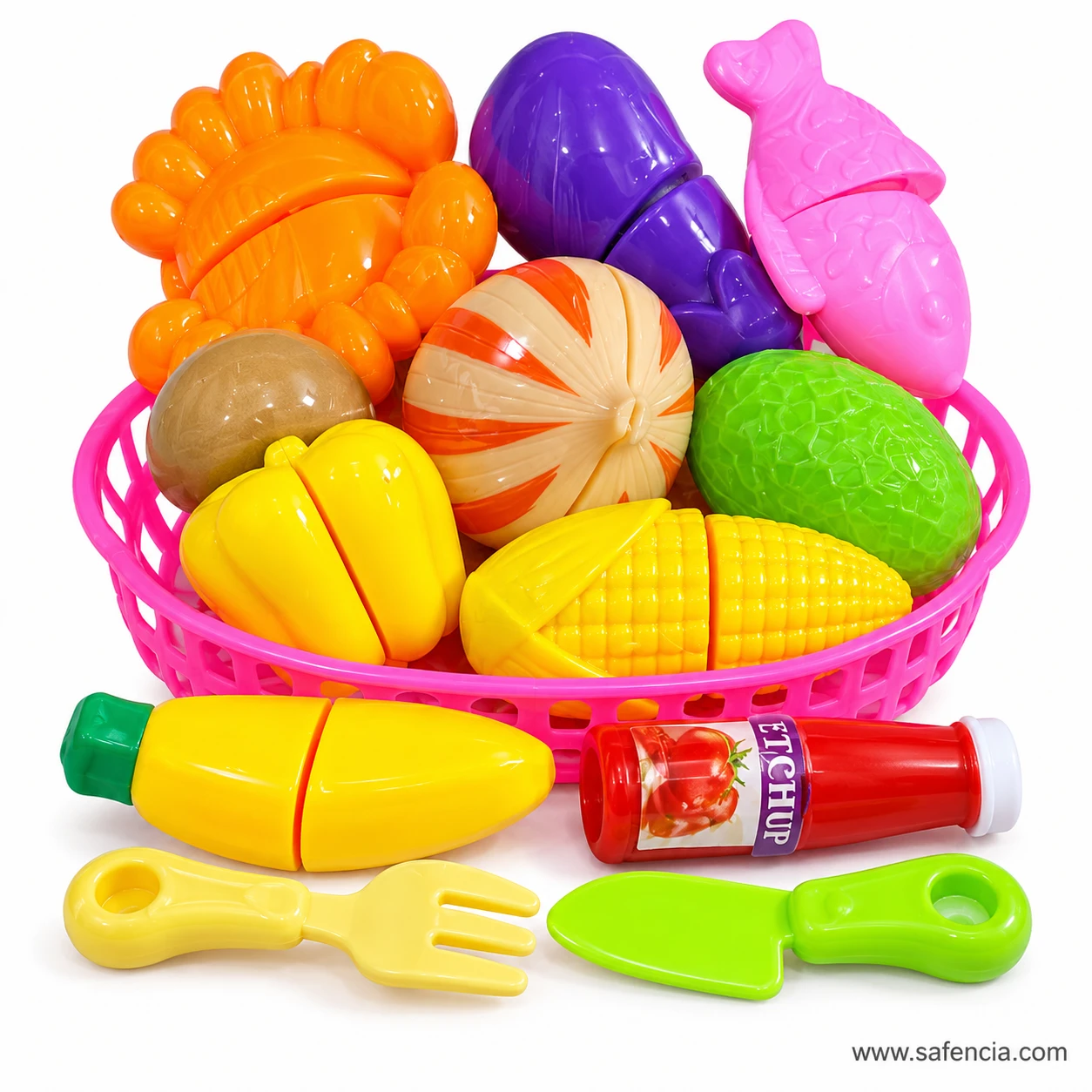 Front view of the pink basket cutting set with the toy fork, green knife, carrot and ketchup bottle in front