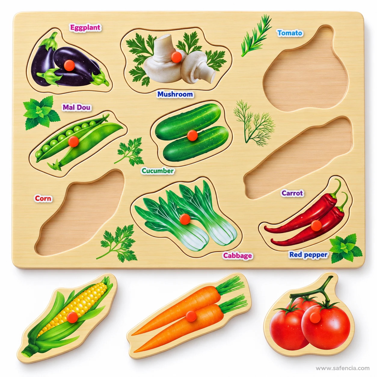 Vegetable puzzle board with the corn, carrot and tomato removed to show their shaped recesses