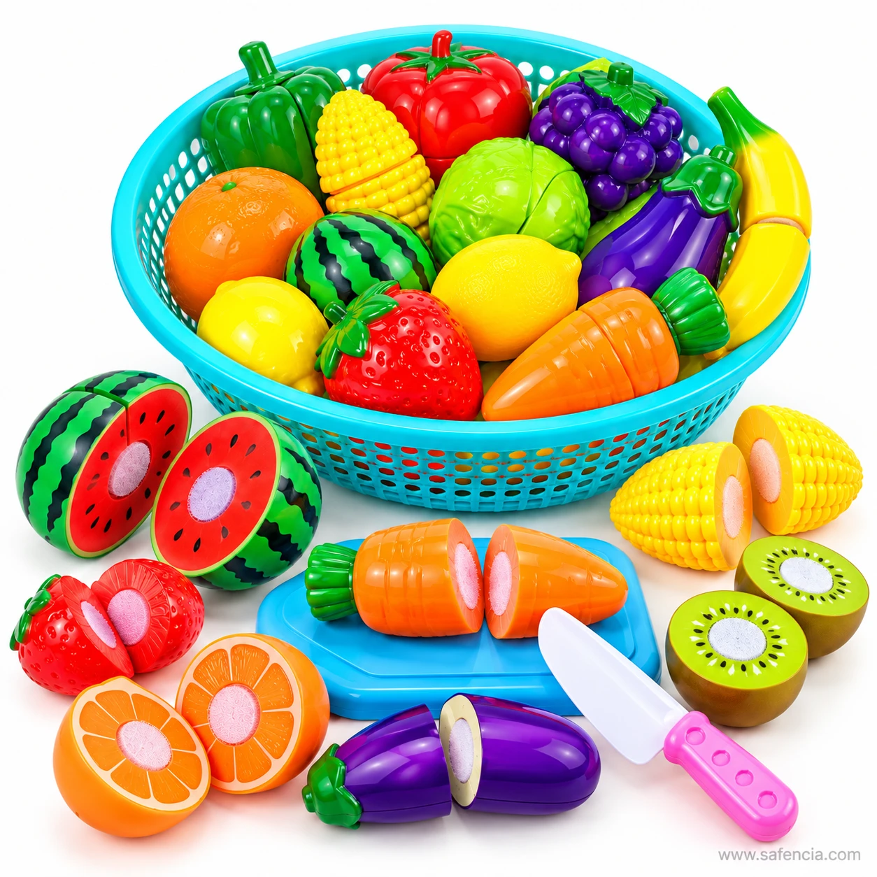 Toy carrot cut in two on the blue chopping board beside watermelon halves, kiwi and corn from the velcro set