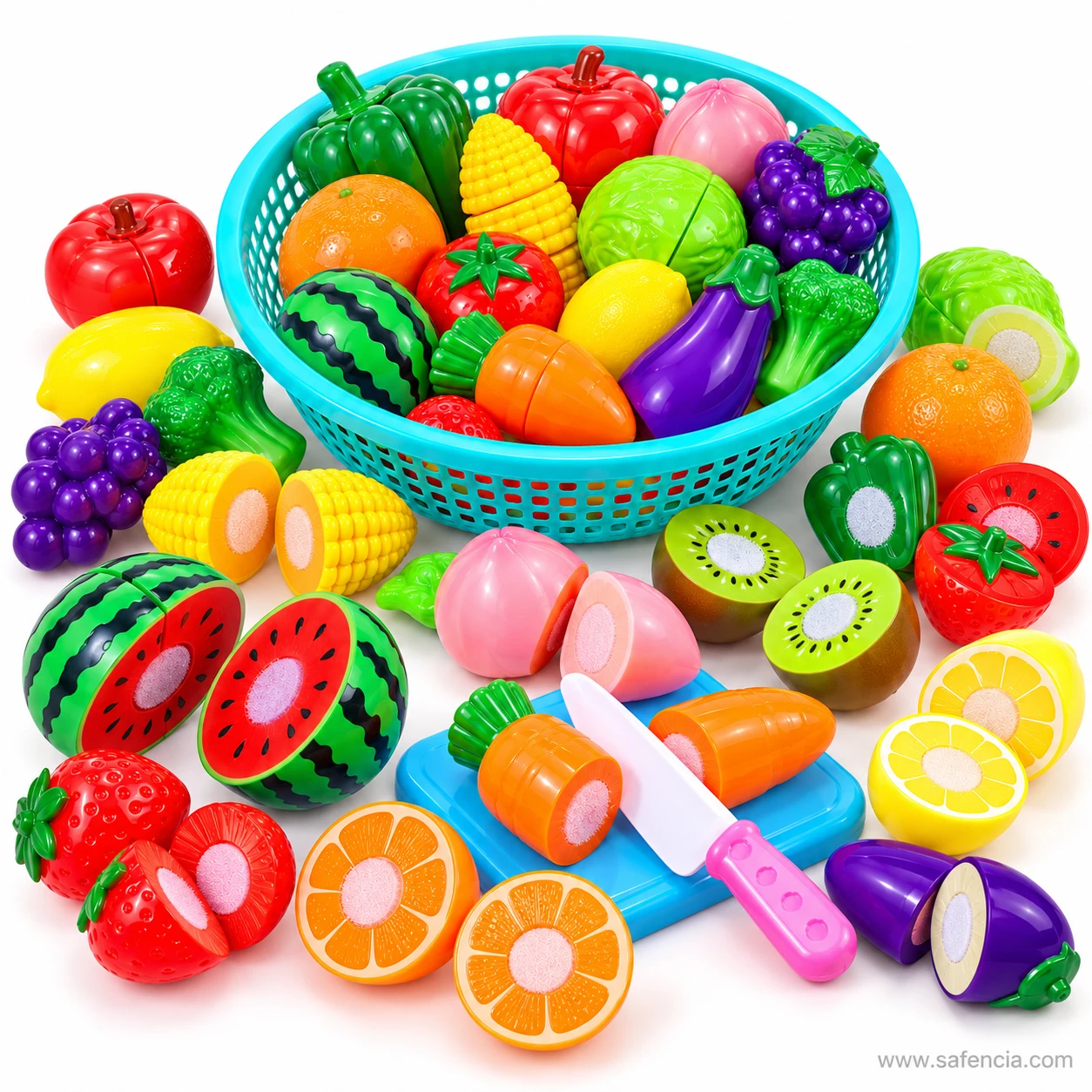 Velcro cutting toy pieces including peach halves, broccoli, grapes and corn spread in front of the basket
