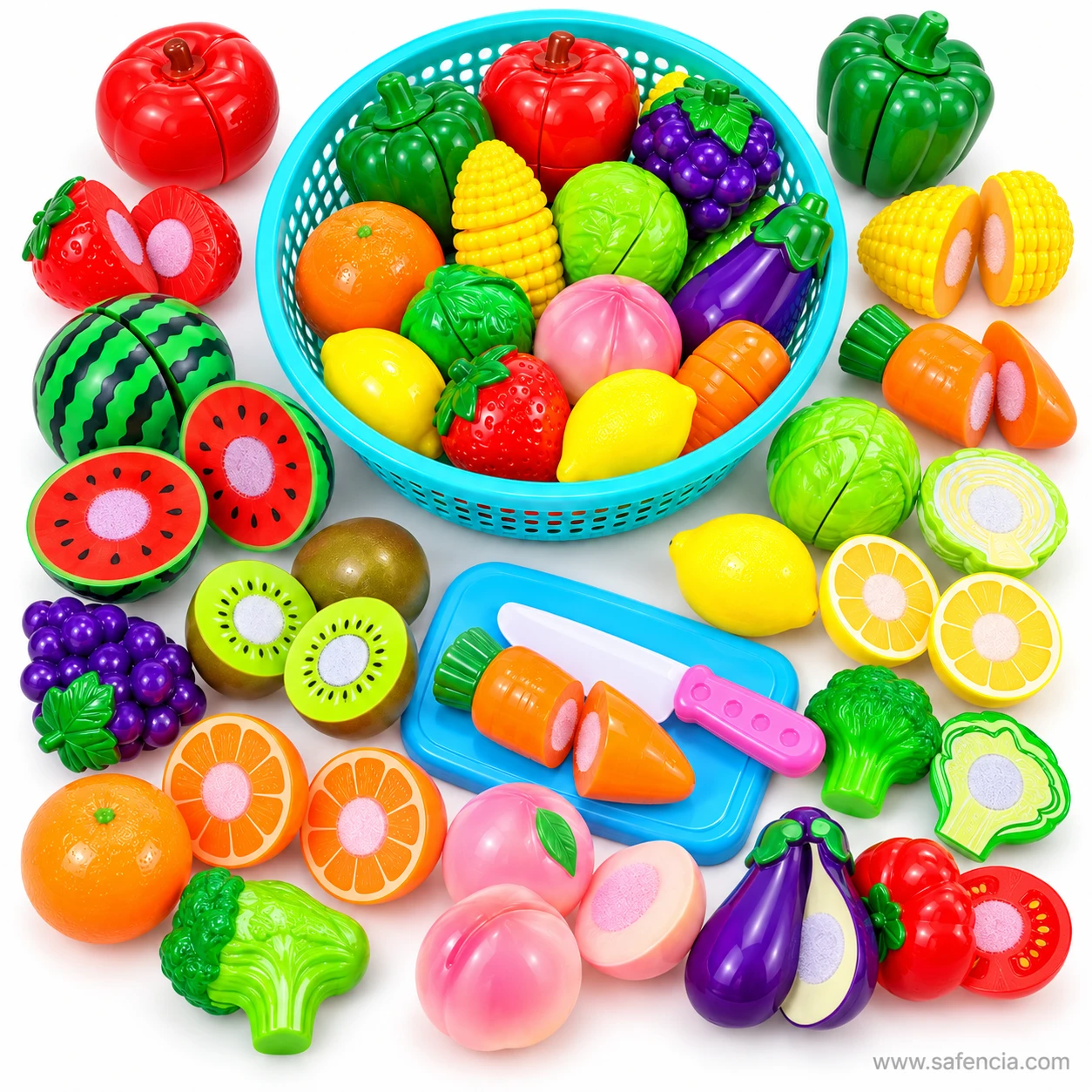 All pieces of the velcro cutting set spread around the basket: watermelon, kiwi, broccoli, peach, aubergine, corn and peppers