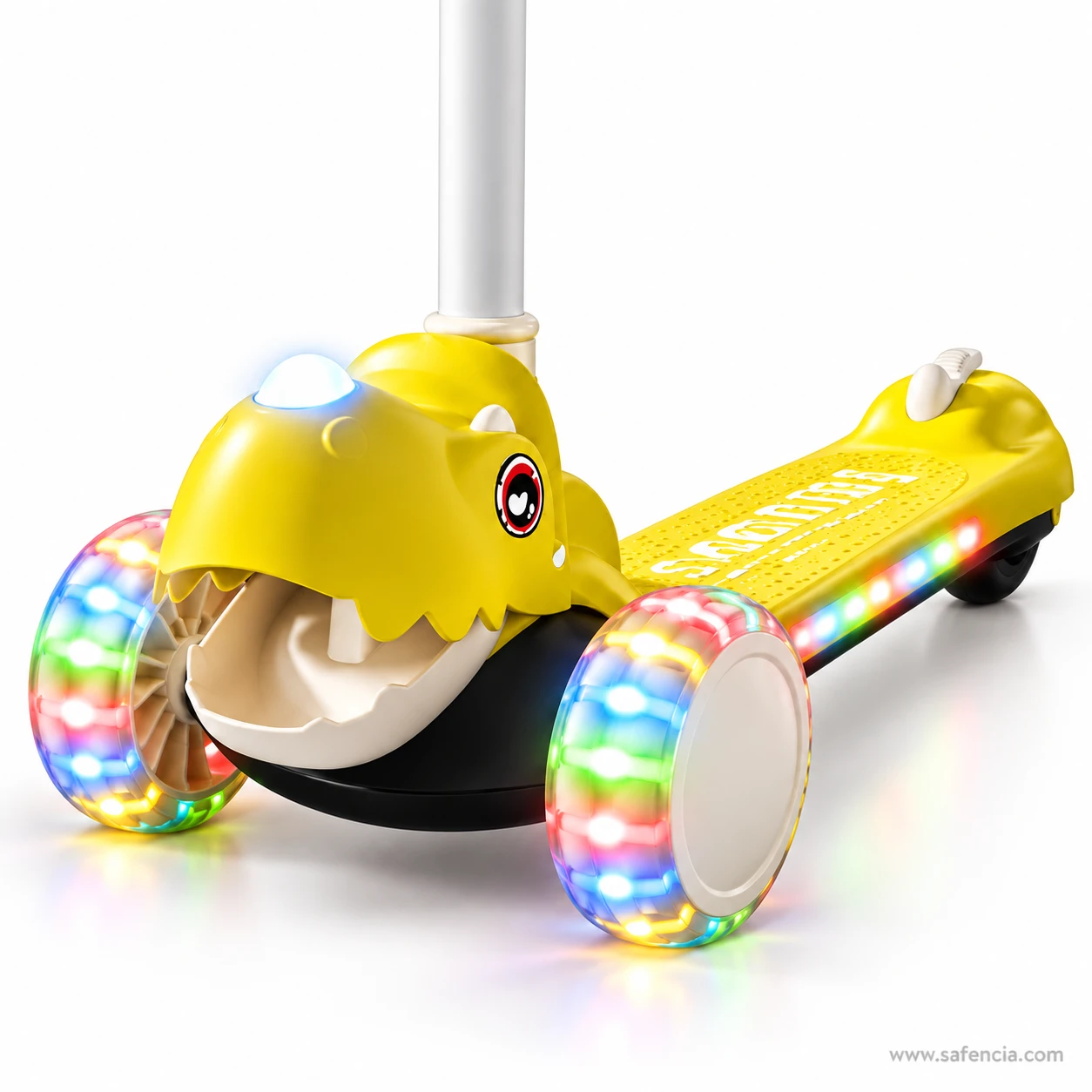 Close-up of the yellow dinosaur head with open jaws and teeth around the rainbow front wheels